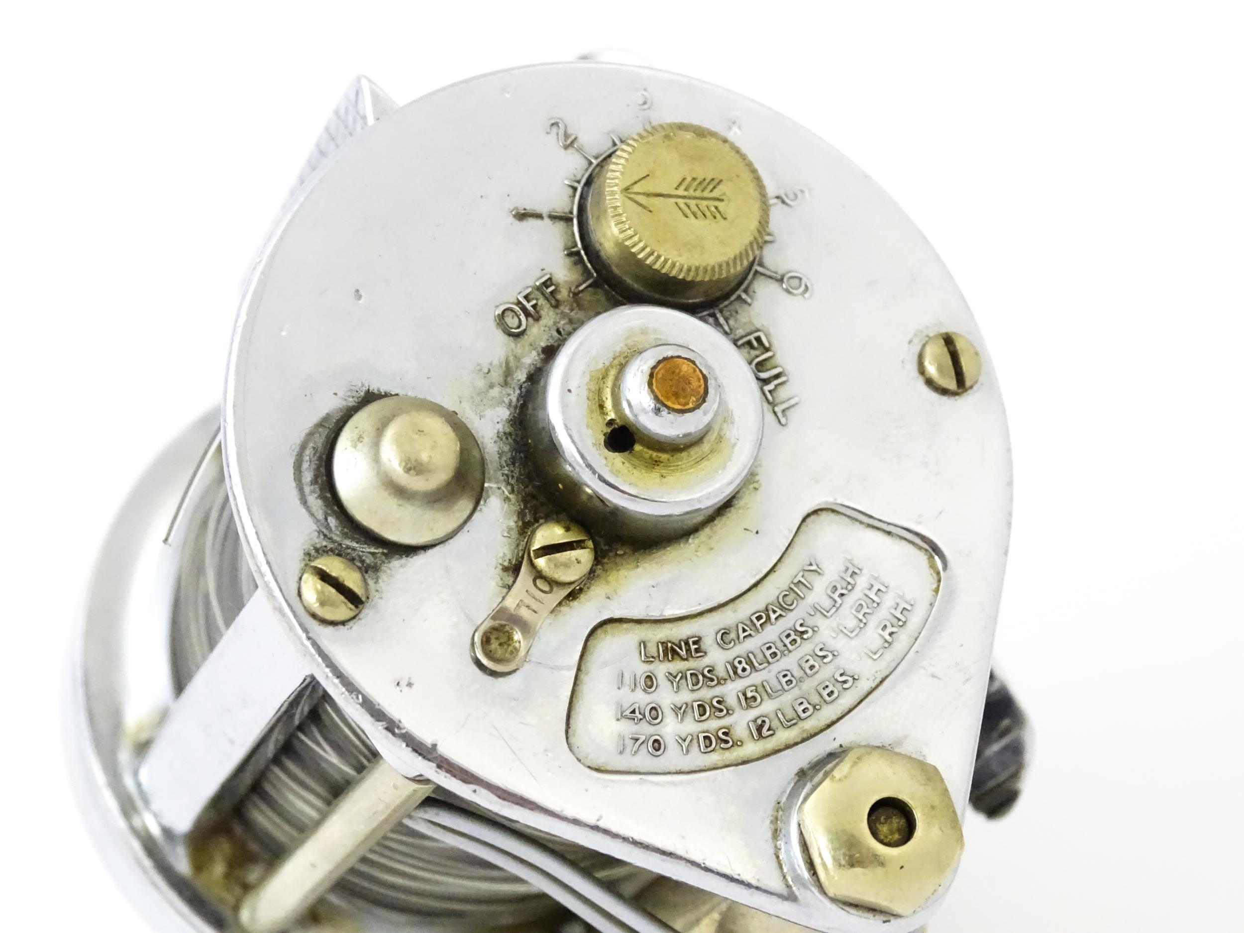 A cased mid 20thC Hardy Bros. Elarex multiplier bait-casting fishing reel. Approx 4 1/4" wide Please - Image 7 of 9