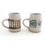 Two studio pottery tankards with brushwork decoration by Marianne de Trey (Mrs Sam Haile). Impressed