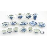 A quantity of assorted 18thC blue and white wares to include tea canister, teapots, tea bowls,