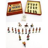 Toys: A boxed set of twelve Britians Ltd. lead soldier figures from the Band of the Royal Marines,