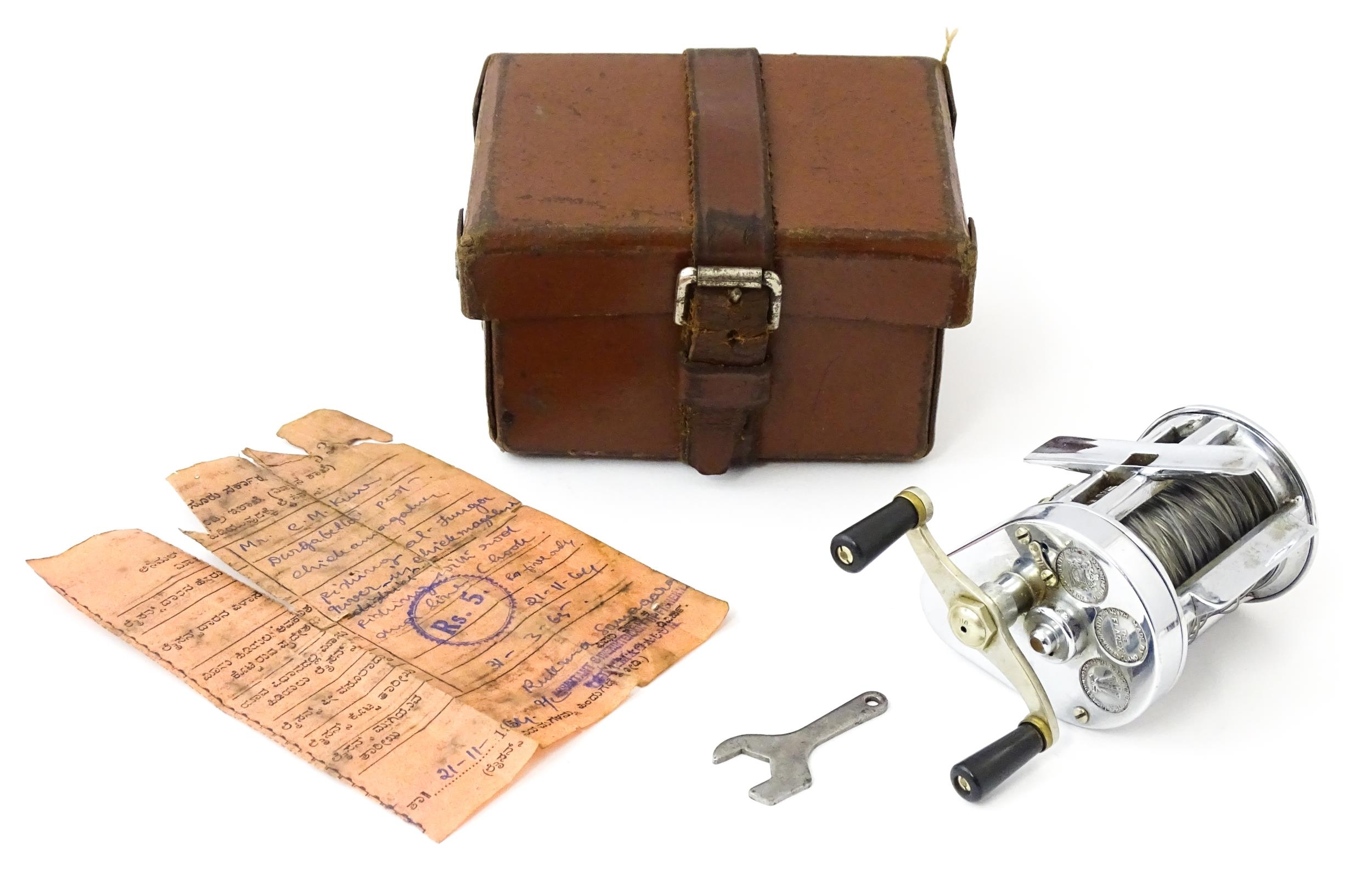 A cased mid 20thC Hardy Bros. Elarex multiplier bait-casting fishing reel. Approx 4 1/4" wide Please