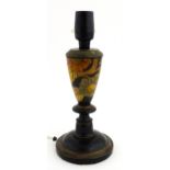 A turned wooden table lamp with floral detail. Approx. 10 1/2" high Please Note - we do not make