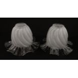 Two glass light / lamp shades with frilled detail. Approx 5" high Please Note - we do not make