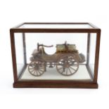 A scratch built scale model in oak of a Victorian Arroll Johnson Scottish automobile / car, within