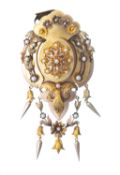 Pendentif broche en or jaune et or rose orné de guirlandes de fleurs