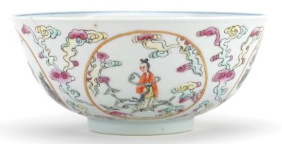 A Chinese porcelain footed bowl, the interior hand painted in blue and white with figures, the