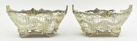 TWO EDWARDIAN SILVER FOOTED BASKETS