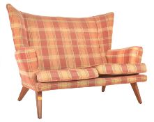 IN THE MANNER OF HOWARD KEITH - MID CENTURY BATWING BACK TWO SEATER SOFA