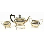 A GEORGE V HALLMARKED SILVER FOUR-PIECE TEA SERVICE