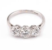 PLATINUM & DIAMOND THREE STONE RING