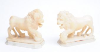 TWO 19TH CENTURY ALABASTER STONE CARVED LIONS