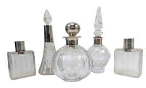 FIVE 20TH CENTURY HALLMARKED SILVER & CUT GLASS SCENT BOTTLES