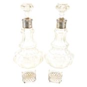 PAIR OF STERLING SILVER COLLAR ACID ETCHED DECANTERS