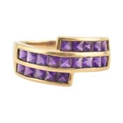 HALLMARKED 9CT GOLD & AMETHYST CROSSOVER RING