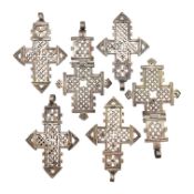 COLLECTION OF SILVER COPTIC CROSS PENDANTS