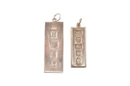 TWO 1970S SILVER INGOT PENDANTS