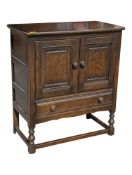 ERCOL FURNITURE - MID 20TH CENTURY ERCOL OLD COLONIAL CUPBOARD