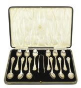 CASED GEORGE V HALLMARKED SILVER SPOON & SUGAR TONG SET