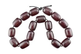 STRING OF CHERRY AMBER BAKELITE BEADS