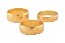 THREE HALLMARKED 22CT GOLD RINGS