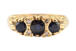 18CT GOLD SAPPHIRE & DIAMOND THREE STONE RING