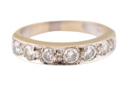 18CT GOLD & DIAMOND HALF HOOP SEVEN STONE RING