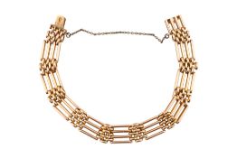 EARLY 20TH CENTURY 15CT GOLD GATELINK CHAIN BRACELET