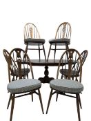 ERCOL FURNITURE - BEECH AND ELM DINING TABLE AND SIX CHAIRS