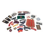 COLLECTION OF ASSORTED MILITARY UNIFORM CLOTH PATCHES