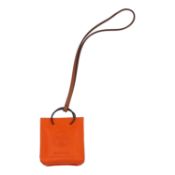 HERMÈS Tascheanhänger "SAC ORANGE".