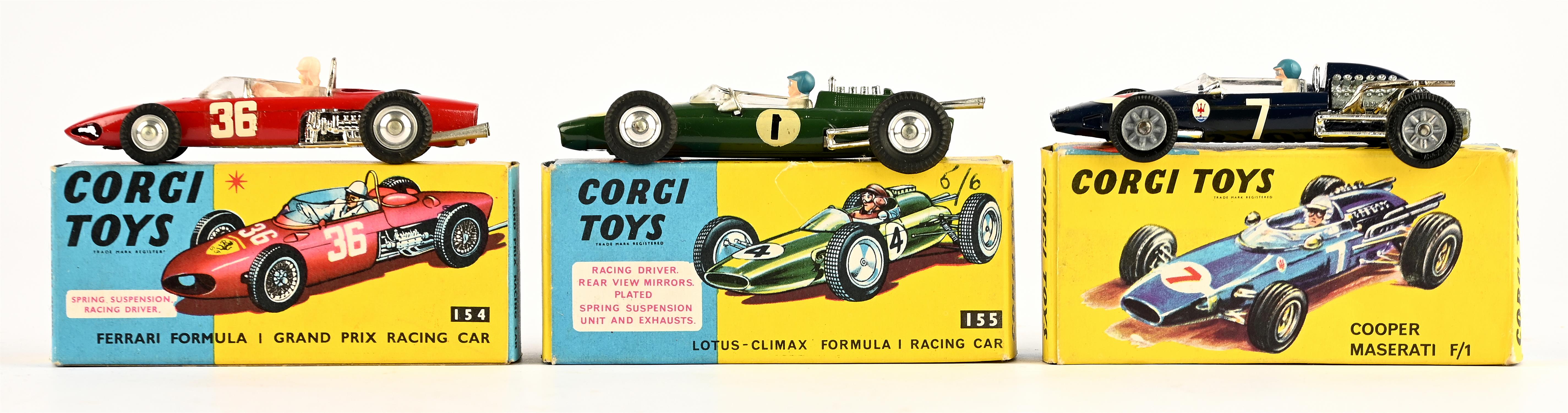 Three diecast racing cars comprising ; Ferrari F1 GP 154, Lotus(01)