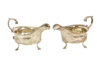 A pair of English George III antique silver Sauceboats, London 1759, by William Skeen, each with