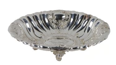 Co. Kilkenny: A large silver plated oval Dish, with 'C' scroll repoussé design, the center section
