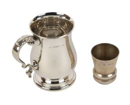 An attractive bulbous design silver Tankard, with scroll handle, Elkington & Co., Birmingham 1947,