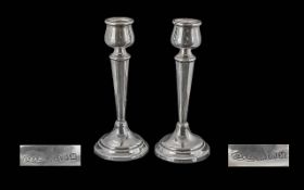 1930s Pair of Sterling Silver Tulip Shaped Candlesticks, raised on round, stepped bases of