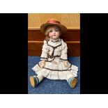 Armand Marseille Porcelain Headed Doll, circa 1912, jointed body, head No. 390, dressed in period