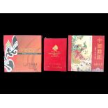 Two 'Paper Cut in China' Volumes, comprising one with birds and animals, and one 'Facial Makeup of