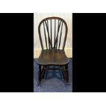 1916 Child's Windsor Style Rocking Chair, made by J Williams. Spindle back, stretchers. Measures