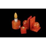 Shatterline Collection of Items, comprising lamp, bookends and candle holder. All in orange hue.