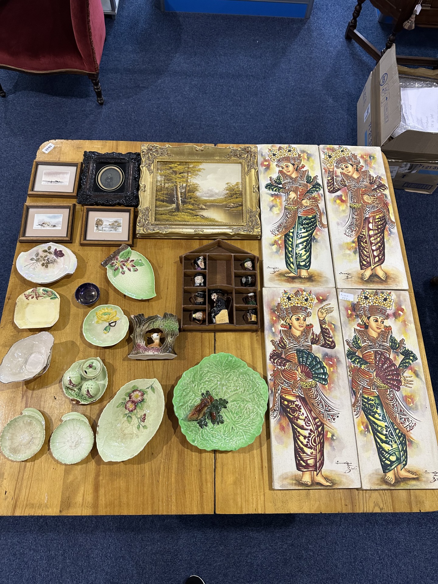 Box of Miscellaneous Items, to include four canvas paintings of a tourist nature, small oil on board