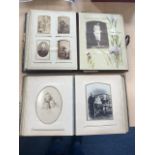 Two Leather Bound Carte De Visite Albums, containing mainly photographs, odd postcards, etc.