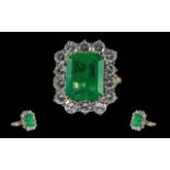 A Stunning Ladies 18ct Gold Emerald and Diamond Set Ring, Marked 18ct to Interior of Shank. The