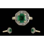 18ct Emerald & Diamond Ring, central rectangular cut emerald 8.6 x 8.04 x 4 mm, surrounded by 14 old