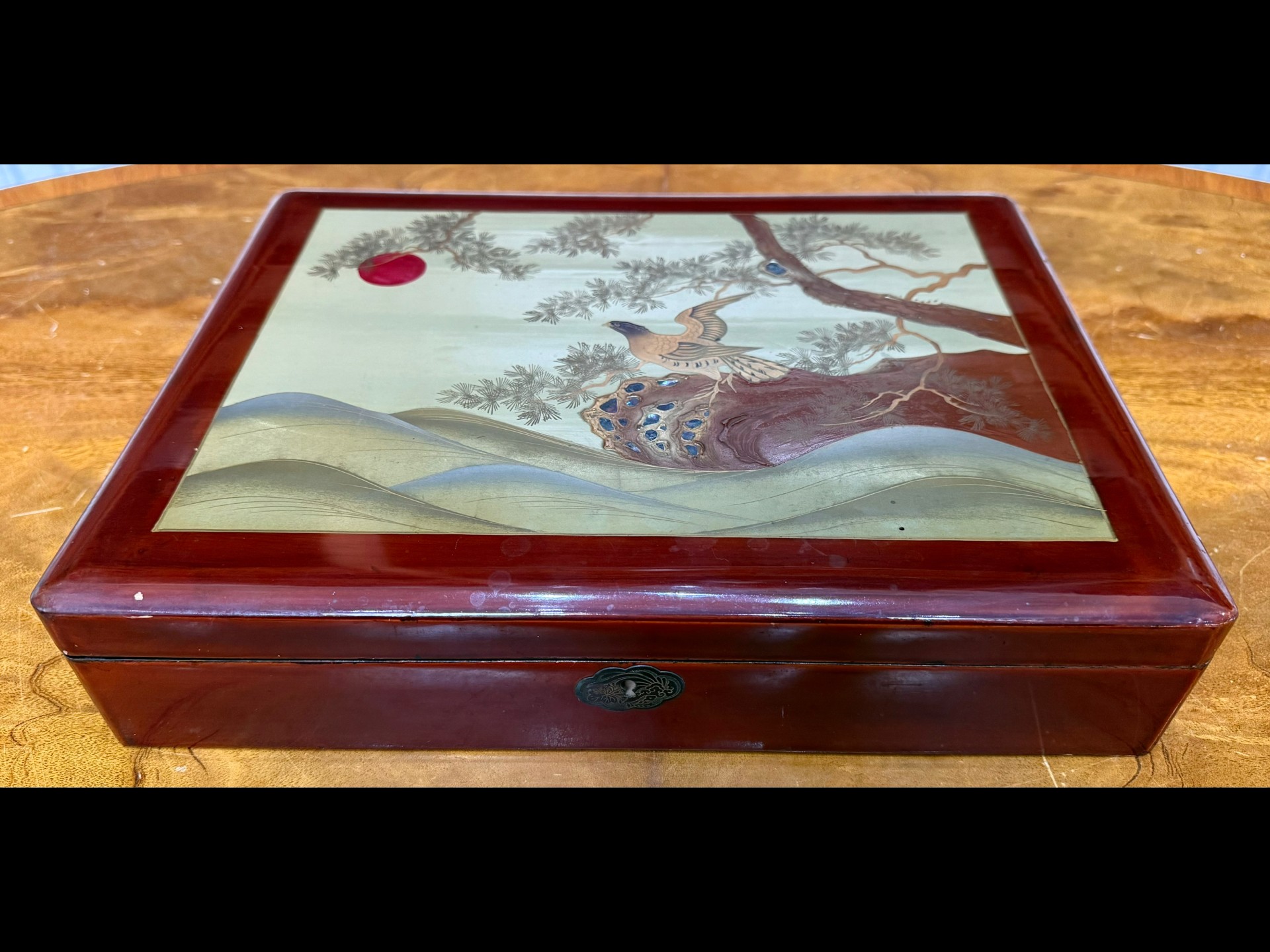 Large Oriental Lacquered Box, top inset with mother-of-pearl, depicting a bird on a tree. Measures