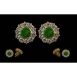 A Fine Pair of 18ct Gold Diamond and Emerald Set Pair of Earrings. Marked 18ct. The Central