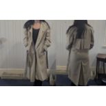 Ladies 'Savannah' Raincoat, size 14, beige double breasted with tie belt. 100% Polyester.