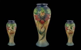 Moorcroft Tall Hand Painted Tube lined Vase ' Anna Lily ' Design. Designed by Nicola Slaney. Date