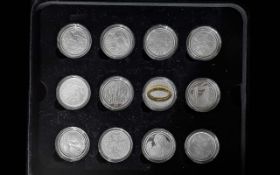 Lord of the Rings Interest. Collection of 925 Sterling Silver Proof Set of ( 12 ) Coins. Housed In a