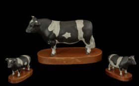 Beswick Champion Coddington Hilt Bar Bull, mounted on a wooden base. Measures 8'' length x 6''