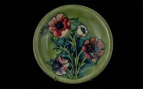 William Moorcroft Signed Hand Painted Shallow Dish ' Anemone ' Design on Green Ground. 7.1/4